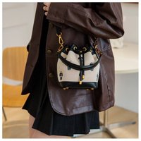 Sac à bandoulière grande capacité tendance et personnalisé en PU pour femme, nouveau sac seau à cordon mignon et texturé avec motif dessin animé