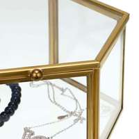 Boîte à bijoux hexagonale en verre transparent de qualité supérieure avec cadre en laiton, utilisée pour le rangement et la présentation de bagues et d'accessoires de bijouterie