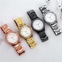 Montre numérique à quartz en acier inoxydable pour homme et femme, boîtier en alliage, style mode luxe, cadeau couple, style professionnel