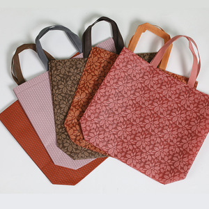 Nonwoven Fabric Tote <b>Bags</b> Embossed Maple Leaf Pattern Reusable Shopping <b>Bags</b> For Business Gift Promotional Use - Product Image 1