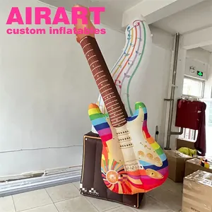 Guitare gonflable en plastique, jouets de guitare gonflable personnalisés, guitare gonflable pour accessoire de scène de festival de musique