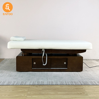 Table de massage professionnelle haut de gamme pour spa et institut de beauté, avec fonction chauffante et mousse à mémoire de forme, idéale pour centres de bien-être et salons de manucure.