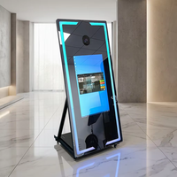 Photomaton miroir magique tout-en-un avec lumières LED bleues et ordinateur intégré pour location professionnelle de mariages et de fêtes