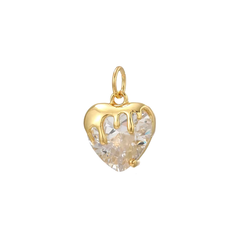 Corazón de cristal dorado con efecto goteo.