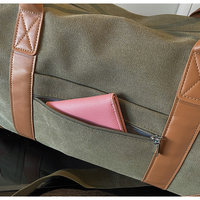 Sac de sport étanche OEM ODM, sac de gym personnalisé en tissu robuste avec poignée en cuir, sac de voyage cylindrique pour la nuit