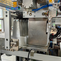 Machine de chargement automatique de cartons électrique haute efficacité XINTU avec contrôle PLC, économie d'énergie, prix compétitif pour la fin de ligne