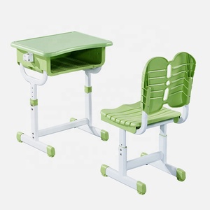 Ensemble de table et chaises d'étude pour étudiants Chaise de classe à cadre en métal enduit de poudre durable empilable pour un rangement facile dans la bibliothèque scolaire - Product Image 1