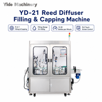 Machine de remplissage et de capsulage de diffuseurs Yide YD-21 avec pressage de bouchons internes, écran tactile PLC et alimentation vibratoire des bouchons