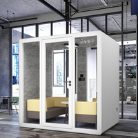 Cabine de réunion de bureau moderne détachable pour 4 personnes, cabine intérieure/extérieure insonorisée avec cadre en acier pour usage de jardin d'immeuble de bureaux