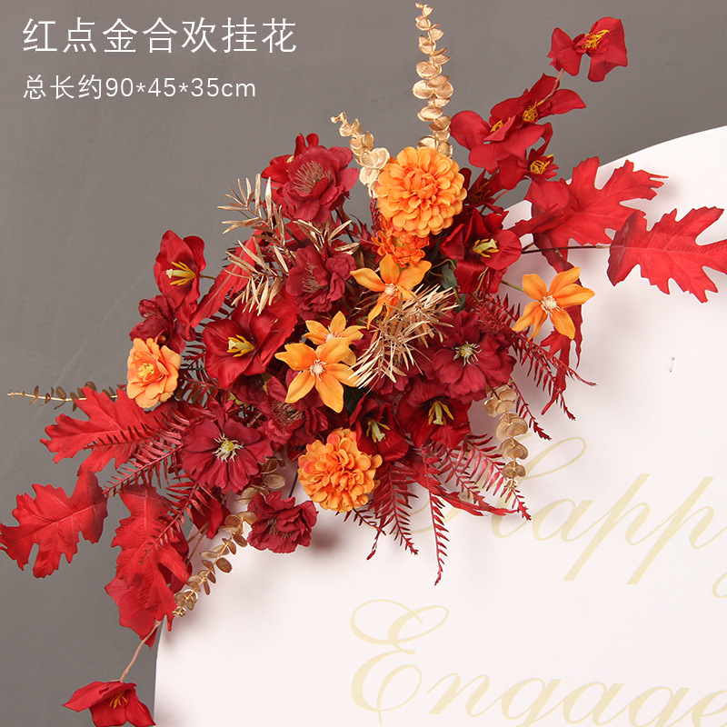 Fleur suspendue en acacia à points rouges