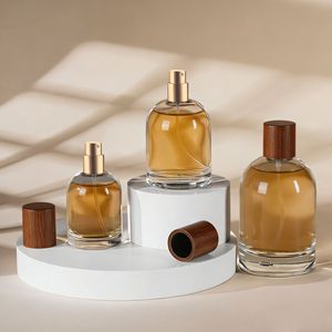 Venta al por mayor de botellas de perfume de lujo personalizadas de 30ML, 50ML, 100ML, de vidrio transparente con pulverizador, tapa de madera y serigrafía, para difusores de varillas. - Product Image 3