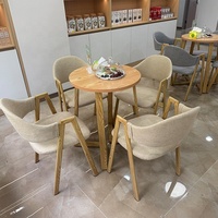 Petite table à manger ronde moderne minimaliste, ensemble de 4 chaises