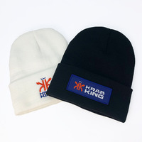 Bonnet tricoté côtelé à revers en acrylique couleur unie avec étiquette tissée personnalisée, style streetwear, chaud pour l'hiver, vente en gros