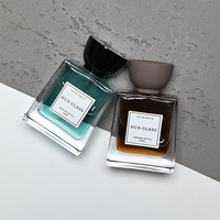 Hochwertige Premium Transparente 50ml 100ml Quadratische Leere Parfümflasche Einzigartiger Unregelmäßiger Schwarzer Brauner Deckel Nachfüllbare Glasflasche