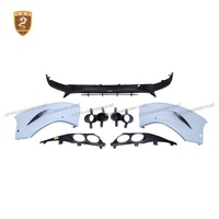 Kit de mise à niveau style 707 pour Aston Martin DBX : pare-chocs arrière en carbone sec, tuyau d'échappement, grilles en fibre de verre
