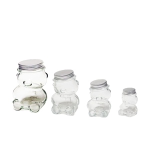 Vente en gros de pots en verre en forme d'ours en peluche de différentes tailles, pots en verre pour miel, bonbons, chocolat avec couvercle à oreilles - Product Image 1