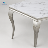 Table à manger en marbre blanc Calacatta naturel Luca |   Pieds en acier argenté poli, plateau rectangulaire, luxe, villa, hôtel, taille personnalisée, USA