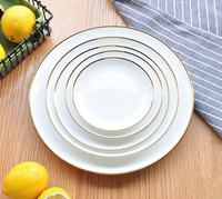 Ensemble de plats décoratifs en porcelaine fine assiettes de chargeur blanches garniture dorée pour la table de dîner en céramique de Style européen de fête de mariage maison
