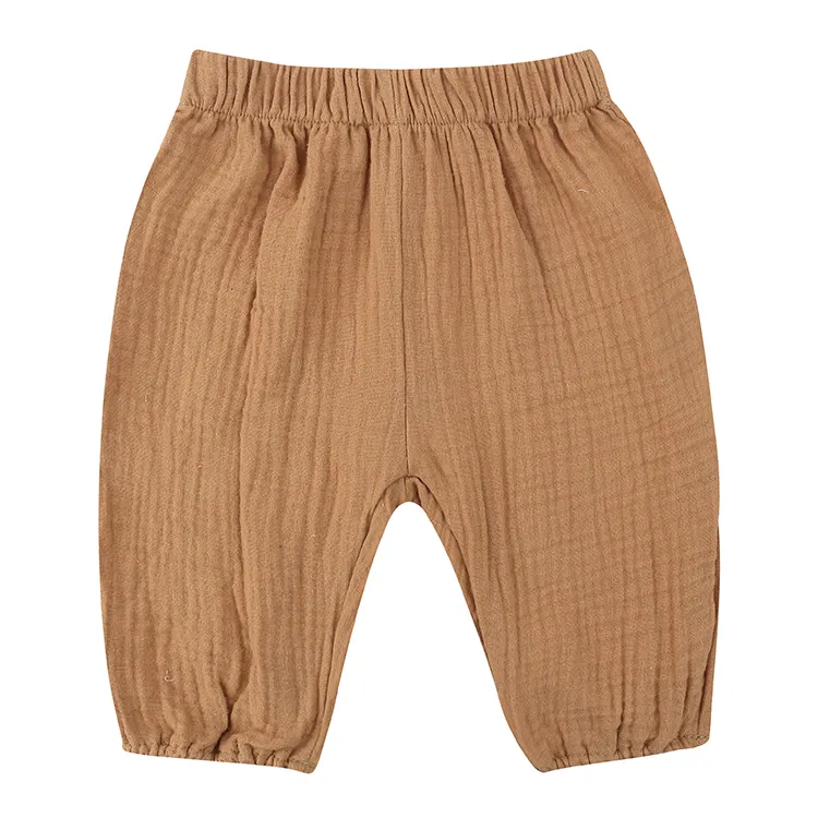 Vente en gros de pantalons d'enfants de haute qualité tissu de coton de mousseline bas quantité minimale de commande pour pantalons de bébé doux et respirants personnalisés