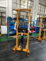 Chariots élévateurs manuels hydrauliques miniatures en direct d'usine 0,5 tonne 1 tonne 1,5 tonne pour une manutention efficace des palettes