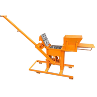 Machine manuelle écologique et mobile à pression pour la fabrication de blocs de terre imbriqués avec boîte de vitesses - Utilisation simple, faible consommation d'énergie