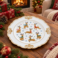 Assiette de présentation en plastique de 13 pouces avec bord doré gaufré et motifs de rennes et flocons de neige imprimés UV pour une décoration élégante de table de banquet de Noël