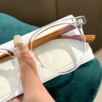 Lunettes anti-lumière bleue pour femmes, style vintage, monture ronde intégrale, motif grain de bois et design épuré