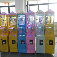 Vente en gros usine : Mini machine à griffes à monnayeur, jeu d'arcade bon marché, petite machine à griffes pour jouets, en métal et verre trempé, garantie 12 mois