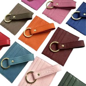 Tarjetero de Cuero Genuino para Hombre y Mujer, Delgado, con 7 Ranuras, Diseño Moderno sin Cierre, Logotipo Grabado, para Tarjetas de Crédito y Bancarias - Product Image 1