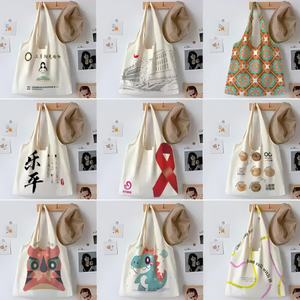 Sac fourre-tout en <span class=keywords><strong>toile</strong></span> de haute qualité sac de t-shirt doux et solide avec logo imprimé sac à provisions à bas prix en gros - Product Image 6