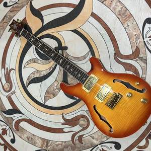 Guitare électrique haut de gamme en bois massif de couleur F-hole, professionnelle pour les performances avec un look haut de gamme et élégant - Product Image 4