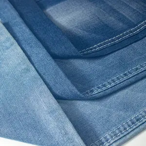 Tissu en Denim Léger Non Élastique 6.8Oz 16*16 60% Coton 25% Poly 15% Viscose Rayonne Indigo Bleu Denim Tissu Pour Jupes