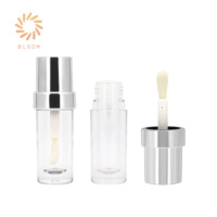 Flacon en plastique cylindrique élégant, corps transparent, tête de brosse large argentée électroplaquée, tube de brillant à lèvres avec bouchon à vis 5 ml