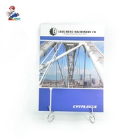 Services d'impression de catalogues et de livres illustrés de haute qualité, avec couverture souple, impression offset, reliure parfaite et conception graphique personnalisée.