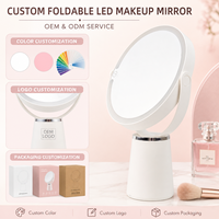 Miroir de maquillage LED rond moderne avec lumière halo et base sur pied stable pour la coiffeuse et la table de toilette de la chambre