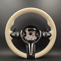 Volant en cuir beige personnalisé avec motif en fibre de carbone pour BMW X5 E70 X6 E71 E72 E82 E87 E88