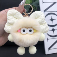 Accessoires de porte-clés : Breloque en fausse fourrure pelucheuse, nœud rembourré doux, boule de charbon écologique, porte-clés promotionnel personnalisable