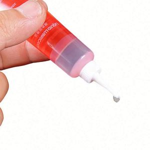 Set de Mantenimiento para Carretes de Pesca a Base de Aceite Rojo y Azul, Impermeable, en Envase Pequeño, Incluye Grasa para Engranajes y Rodamientos, en Blíster de Cartón - Product Image 4