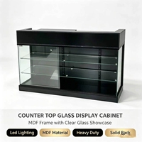 Étagère en verre multicouche, porte coulissante en verre, panneau arrière solide, éclairage LED robuste, vitrine d'exposition