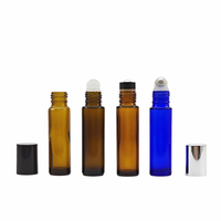 Vente en gros de bouteilles à rouleaux en verre transparent de 8ml 10 ml avec inserts en rouleau de verre et bouchons noirs blancs