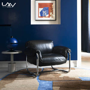 Poltrona italiana moderna <span class=keywords><strong>e</strong></span> minimalista in <span class=keywords><strong>nero</strong></span> <span class=keywords><strong>divano</strong></span> da soggiorno Hotel nordico con struttura in metallo pelle Villa poltrona per il tempo libero - Product Image 1