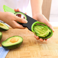 Gadget de cuisine multifonctionnel : Coupe-avocat en plastique, couteau à dénoyaouter et outil de découpe pour fruits et légumes