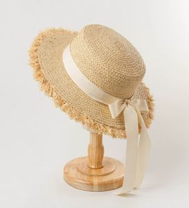 W645 Sombrero de paja plano de primavera y verano para niños, nuevo estilo con borde cepillado, lazo de rafia, sombrero de Sol de moda para viajes al aire libre - Product Image 2