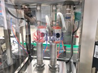 Machine de remplissage et de scellage automatique YB-QW2 pour aérosols de neige artificielle et serpentins de fête