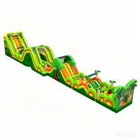 Parcours d'obstacles gonflable géant sur le thème de la jungle tropicale, château gonflable combiné avec toboggan aquatique et sec, parcours de course stimulant