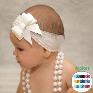Neue europäische und amerikanische bonbon farbene Princess-Stirnbänder, weiche und bequeme Nylonbogen-Stirnbänder, Baby-Haarschmuck - Product Image 1