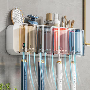 Soporte de pared para cepillos de dientes Asue con triple ventosa, organizador de baño que ahorra espacio con exprimidor de pasta dental - Product Image 2