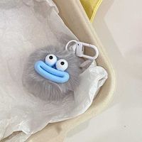 Clown drôle gros oeil saucisse bouche boule de poils moelleux Pom boule de fourrure Pom poms porte-clés peluches jouets en peluche poupée moche bouffée boule porte-clés
