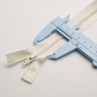 Fermeture éclair à glissière auto-bloquante en nylon n°3 avec tête en forme de gourde amande et film anti-usure pour accessoires de vêtements et textiles de maison