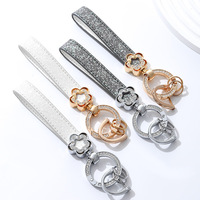 Porte-clés floral de luxe incrusté de diamants, accessoires pour sacs à main pour femmes, cadeau créatif personnalisé, pendentif en métal pour clés de voiture